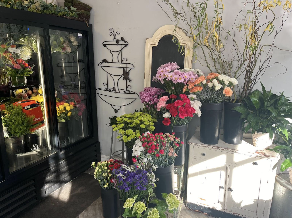 In a tiny building off of Post Road in Wayland, Jolene Palumbo runs her own flower shop dedicated to making floral arrangements and bouquets for Wayland residents, or anyone who comes by her small business. "It can be really busy at times," Palumbo said. "The phone will be ringing and many people will be coming in while other days are pretty quiet, so I can do extra things like cleaning and getting ready for the next day." 